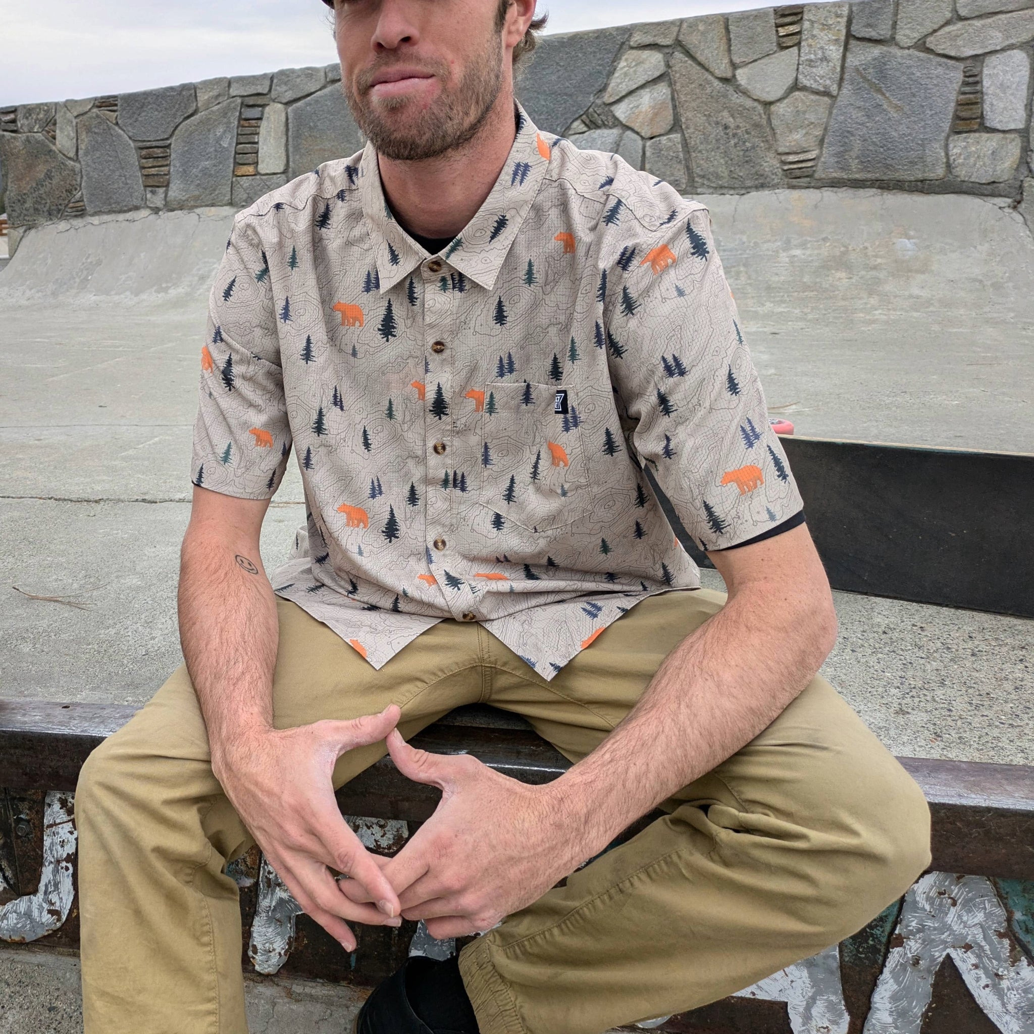 Model wearing the Langley performance shirt that is breathable and stretchy