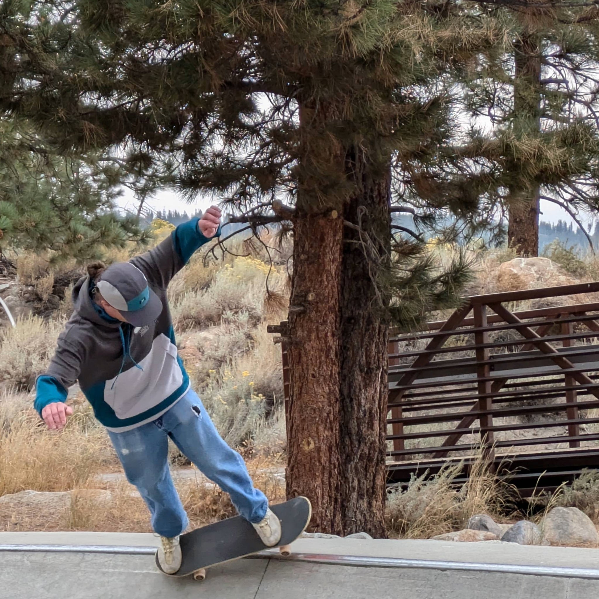 Skateboarder wearing the Faultline395 Cloud 9 sweatshirt showcasing its performance aspects