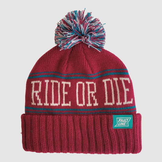 Photo of the Ride or Die Beanie in a bright maroon, teal, and white colorway.