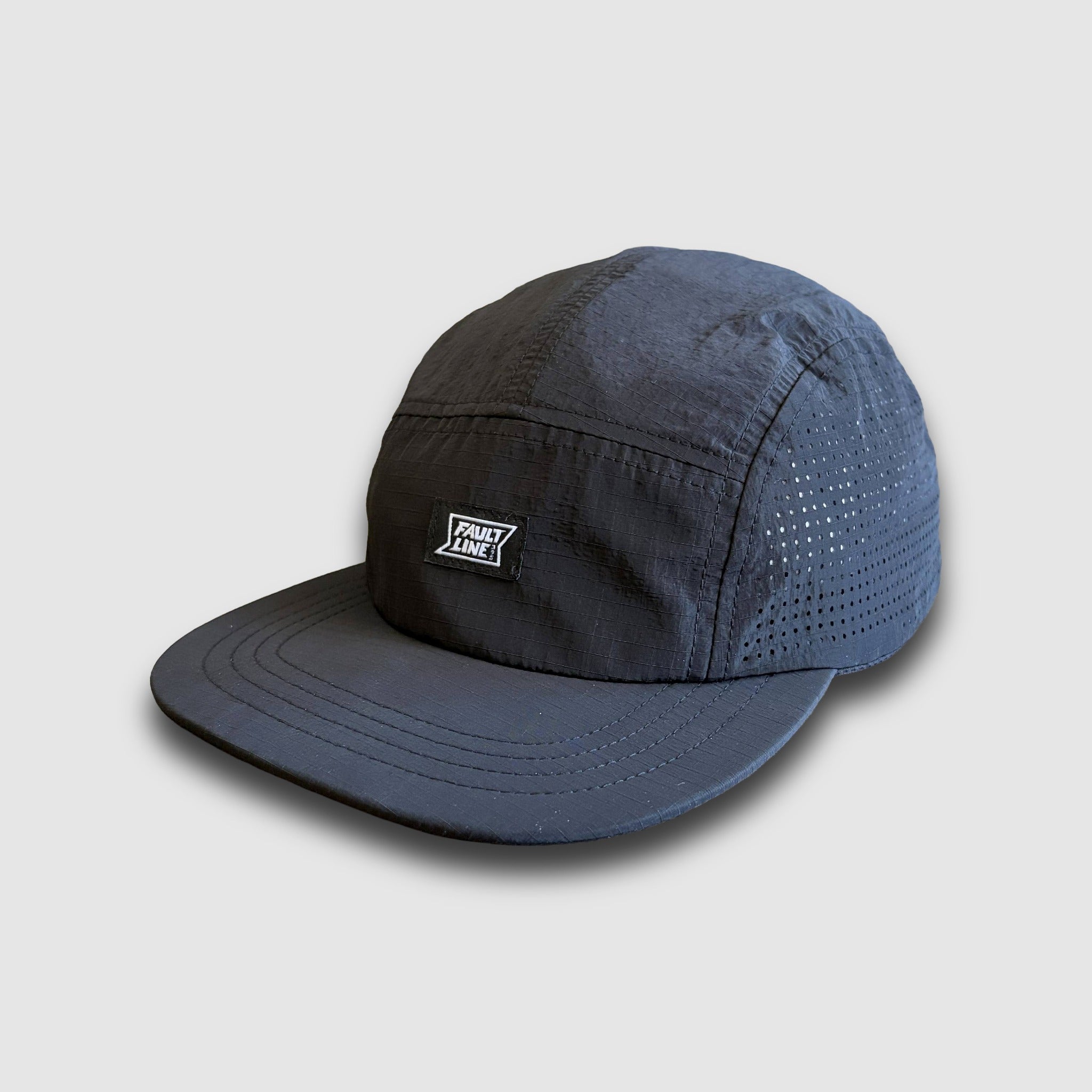 Black Camper Hat with a FaultlIne395 brand logo