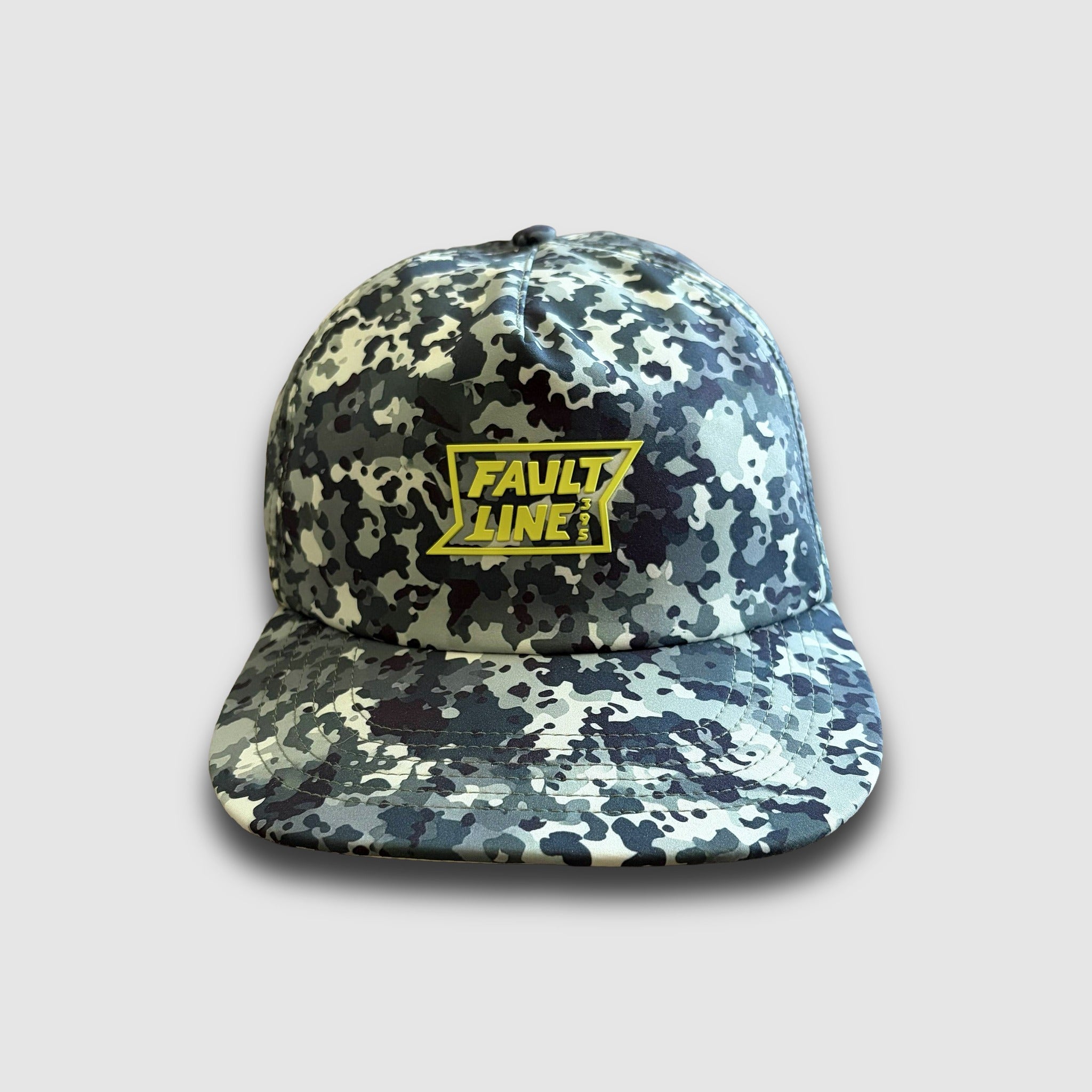 Camouflage-patterned cap with FAULT LINE 395 logo