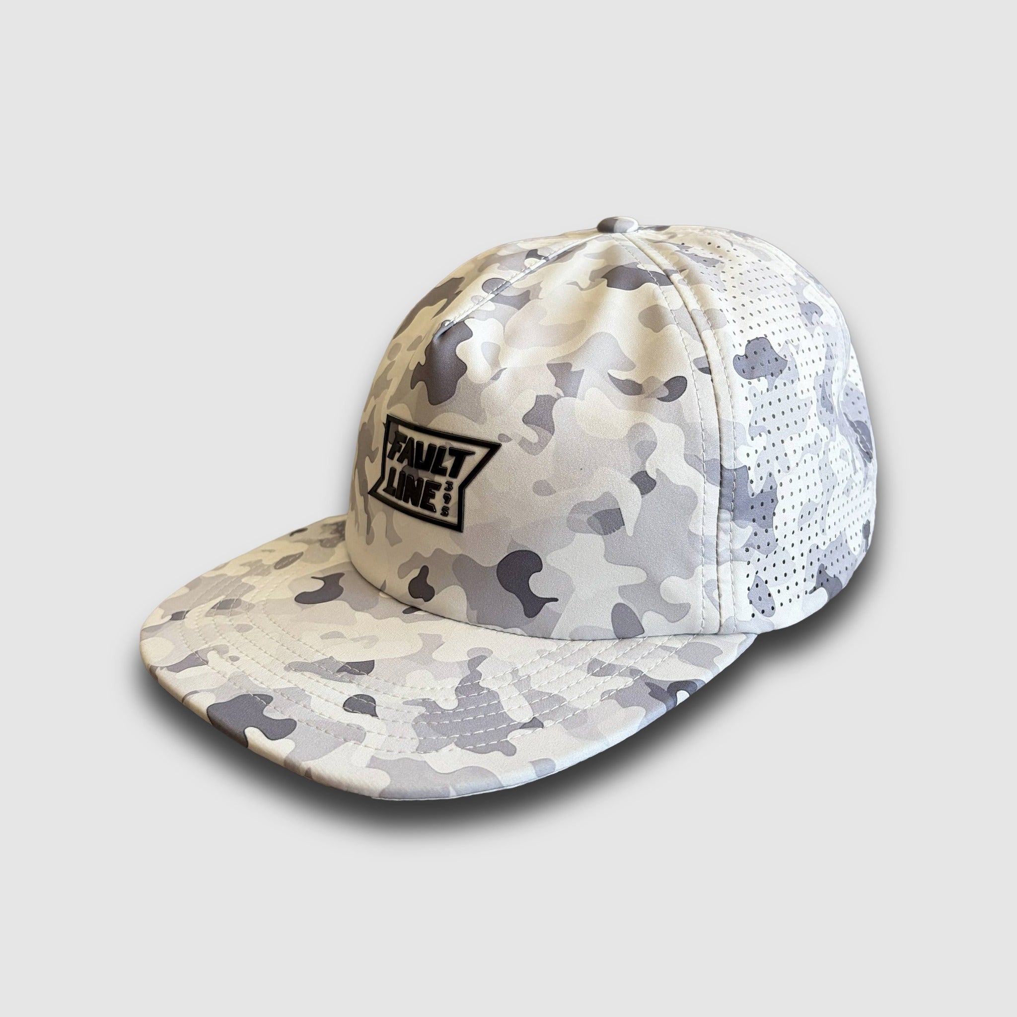 Gray and white camouflage-patterned cap with a rubberized Faultline395 brand logo on the front