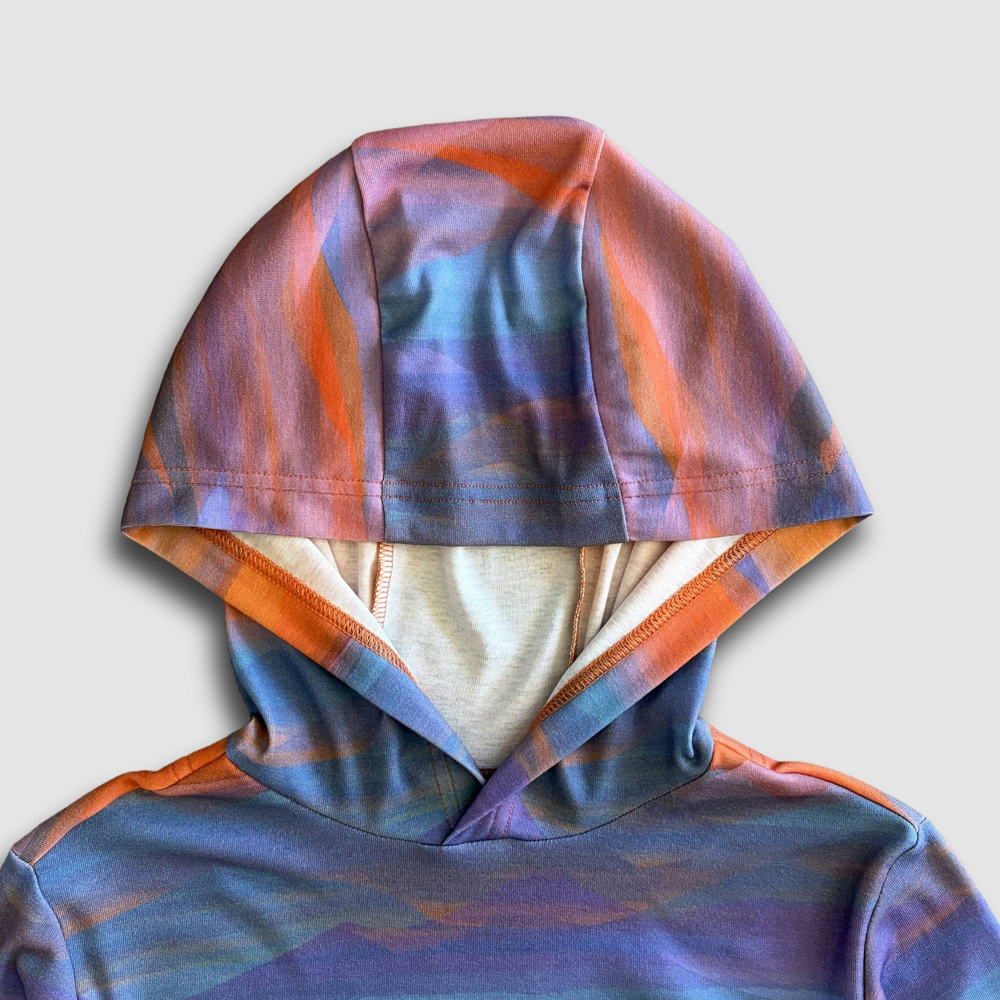 Colorful hooded sun shirt from Fautline395 in a women's specific cut