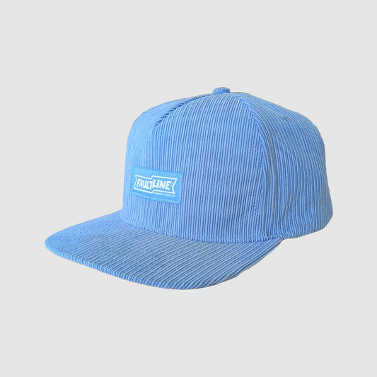 Light blue corduroy snapback hat with Faultline 395 logo label on the front