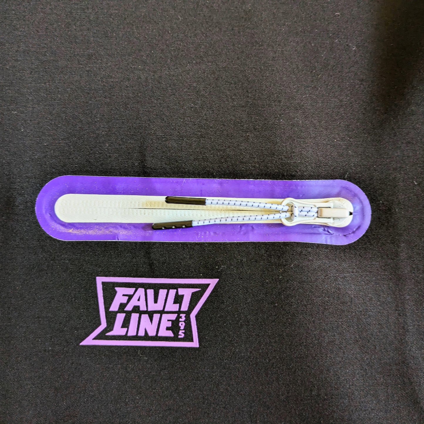 Close up of the left chest pocket on the Could 9 Double Hood Hoodie with a waterproof zipper