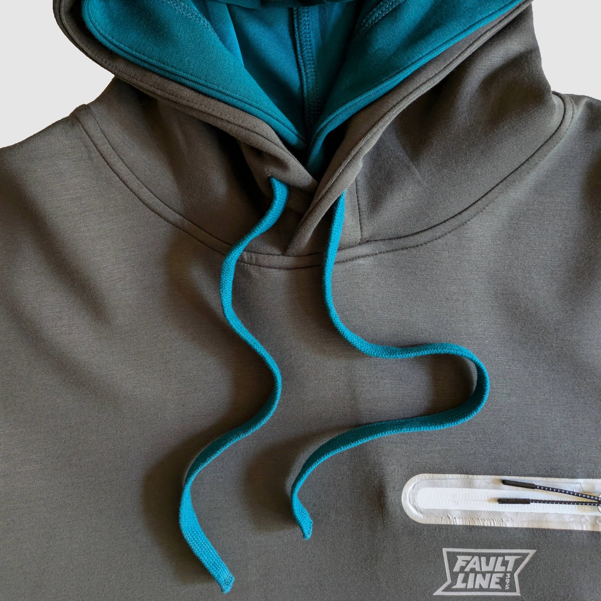 Close-up view of the chunky drawcord and double hood featured on the Faultline395 Cloud 9 hoodie