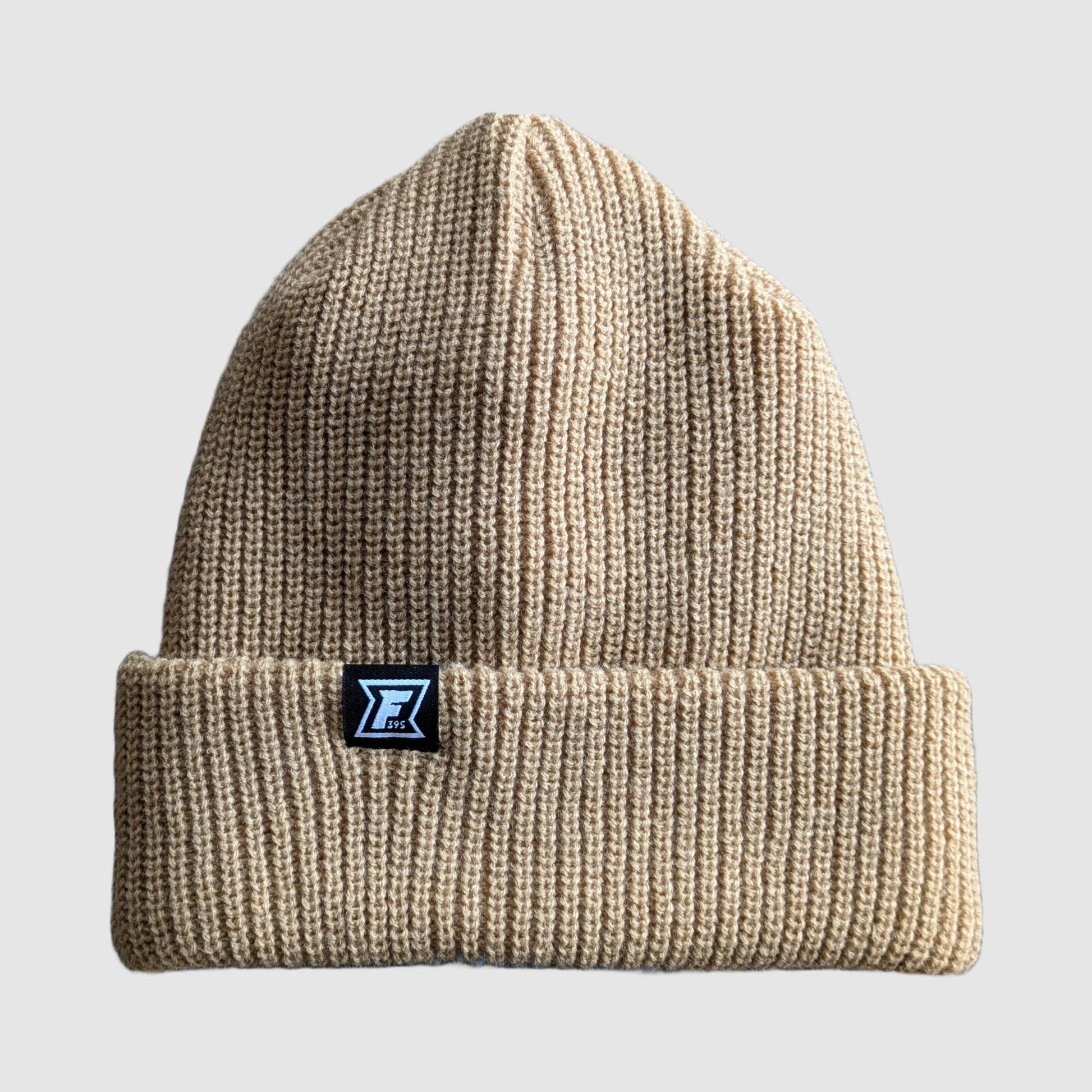 Photo showing the tan side of our split color beanie, with blue on the other side.