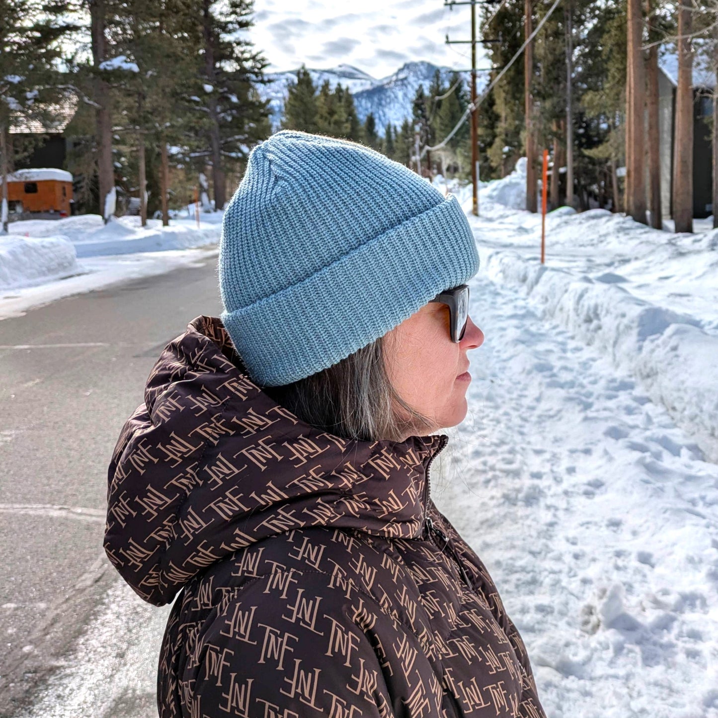 Side view of the Faultline395 2Tone beanie being worn by a person.