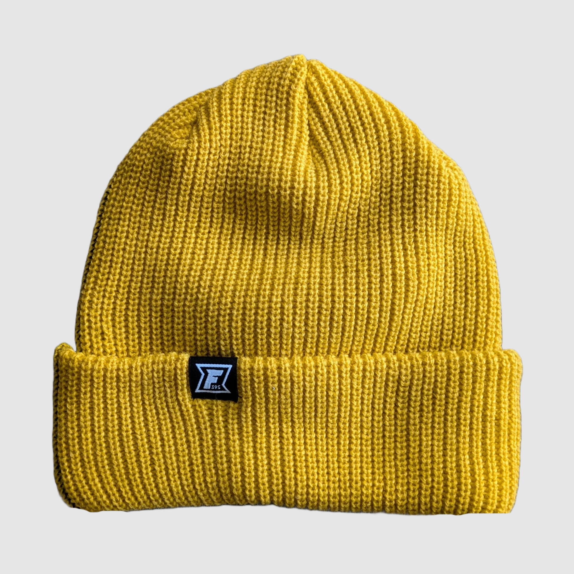 Photo of the yellow half of the split color beanie, with green on the other side, from Faultline395.