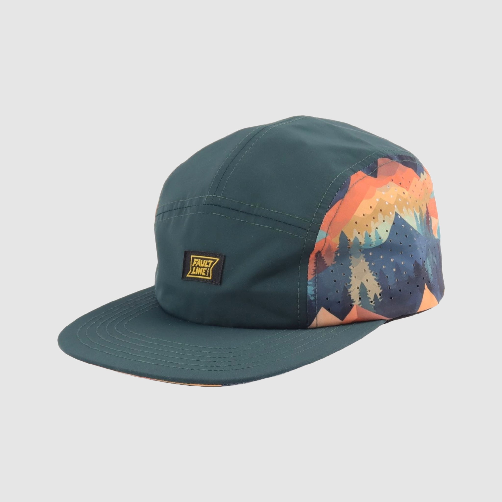 Diagonal view of of the Bridgeport 5-Panel Camper Hat in Golden Hour, featuring alpine-inspired artwork.