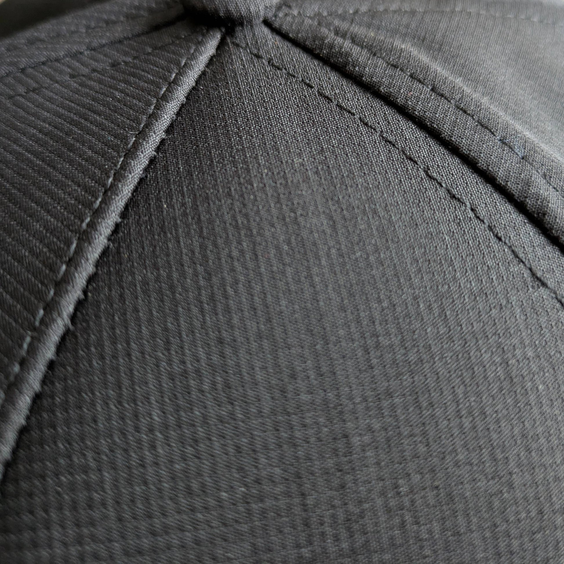 Close up view of the textured performance fabric we use on our Mountains and Beer hats.