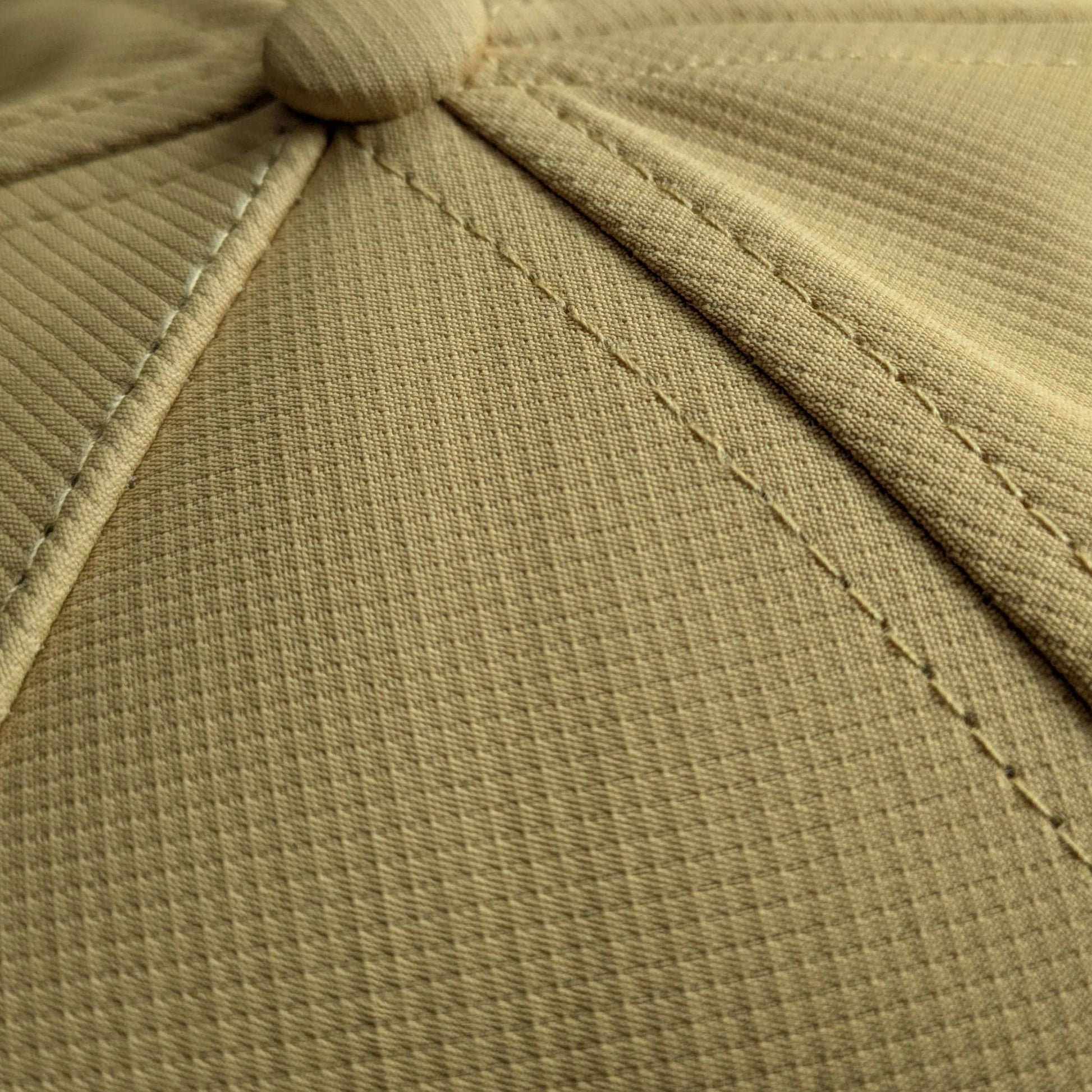 Detailed shot of the performance fabric we used on the Mountains and Beer hat collab with Distant Brewery.