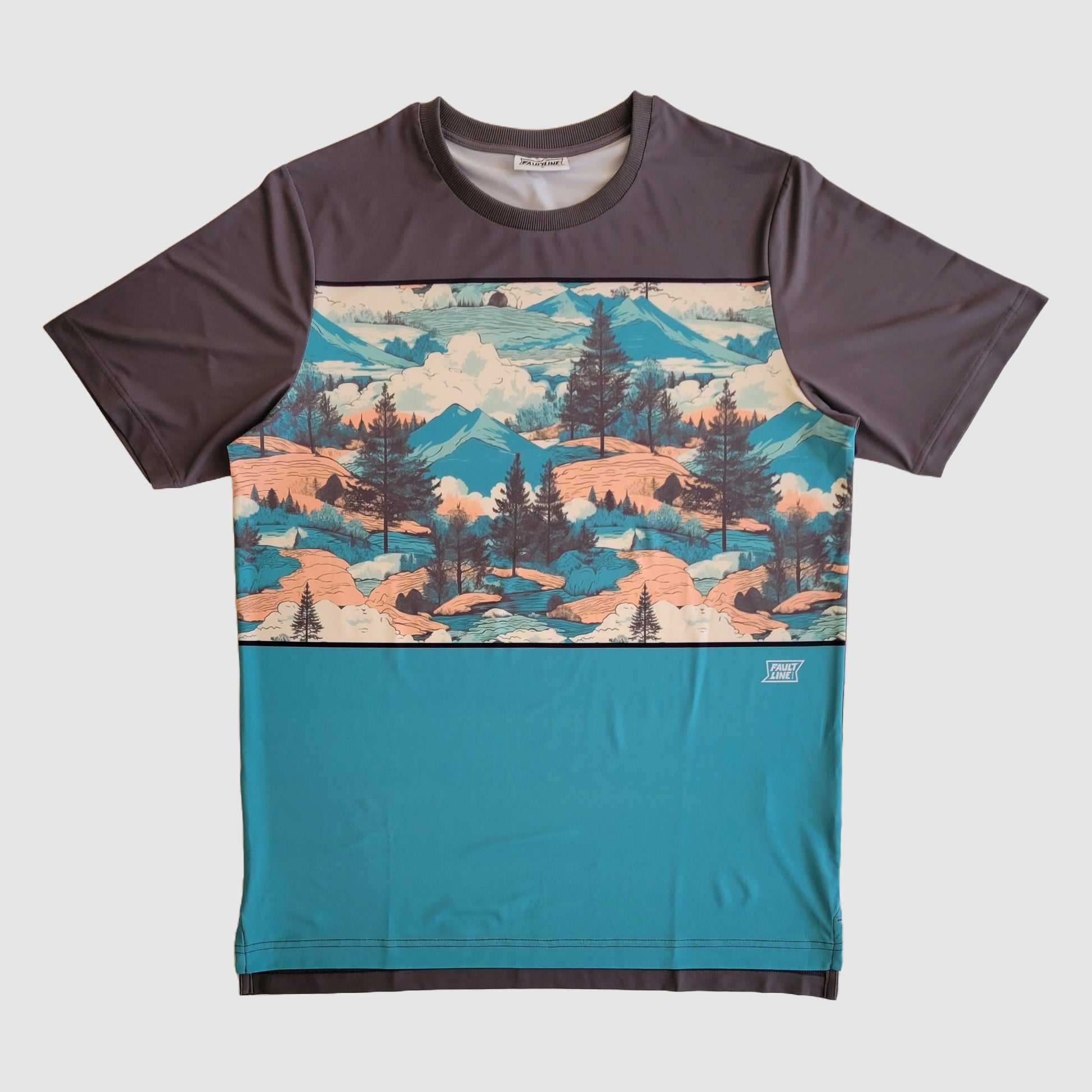 Front view of the Crowley Tech Tee featuring a retro mountain landscape design.