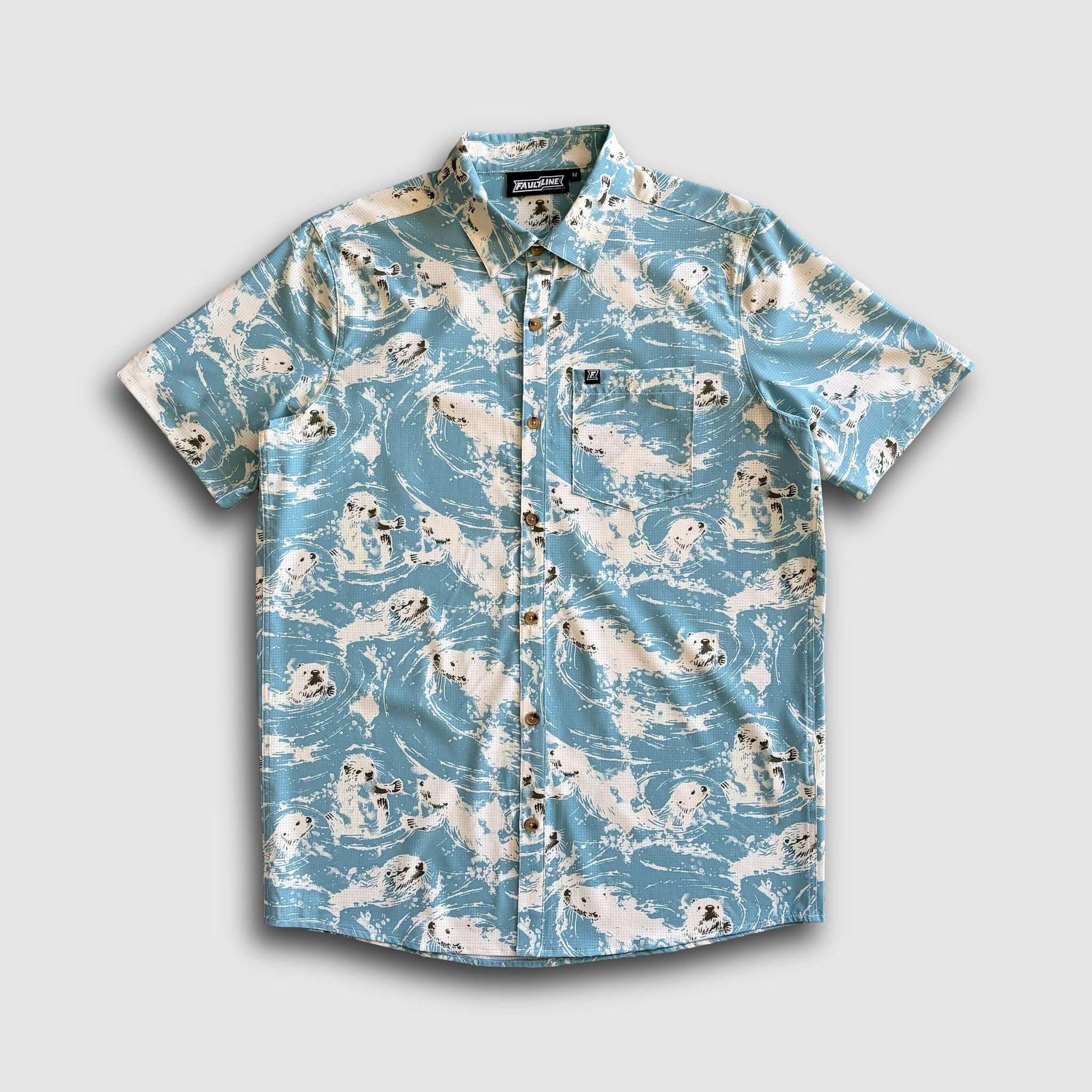 Short-sleeve shirt with sea otter pattern on a light gray background