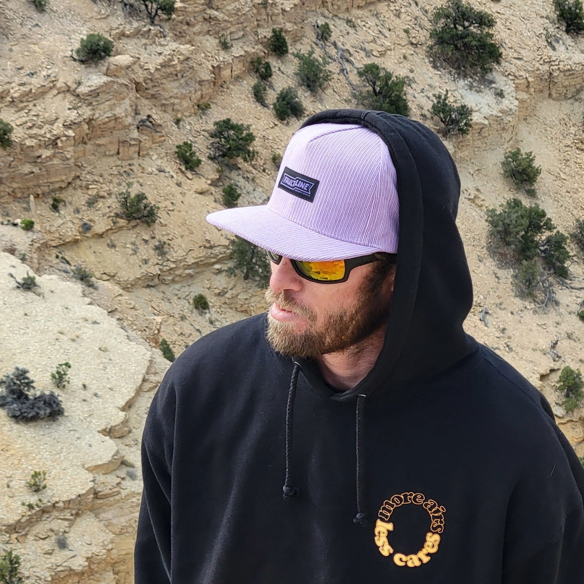 Model wearing trendy lilac corduroy snapback for casual outdoor look