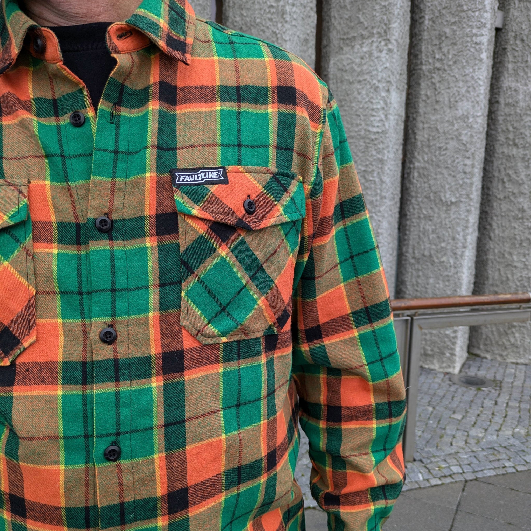Close up of the Faultline395 McCoy flannel being worn by a person