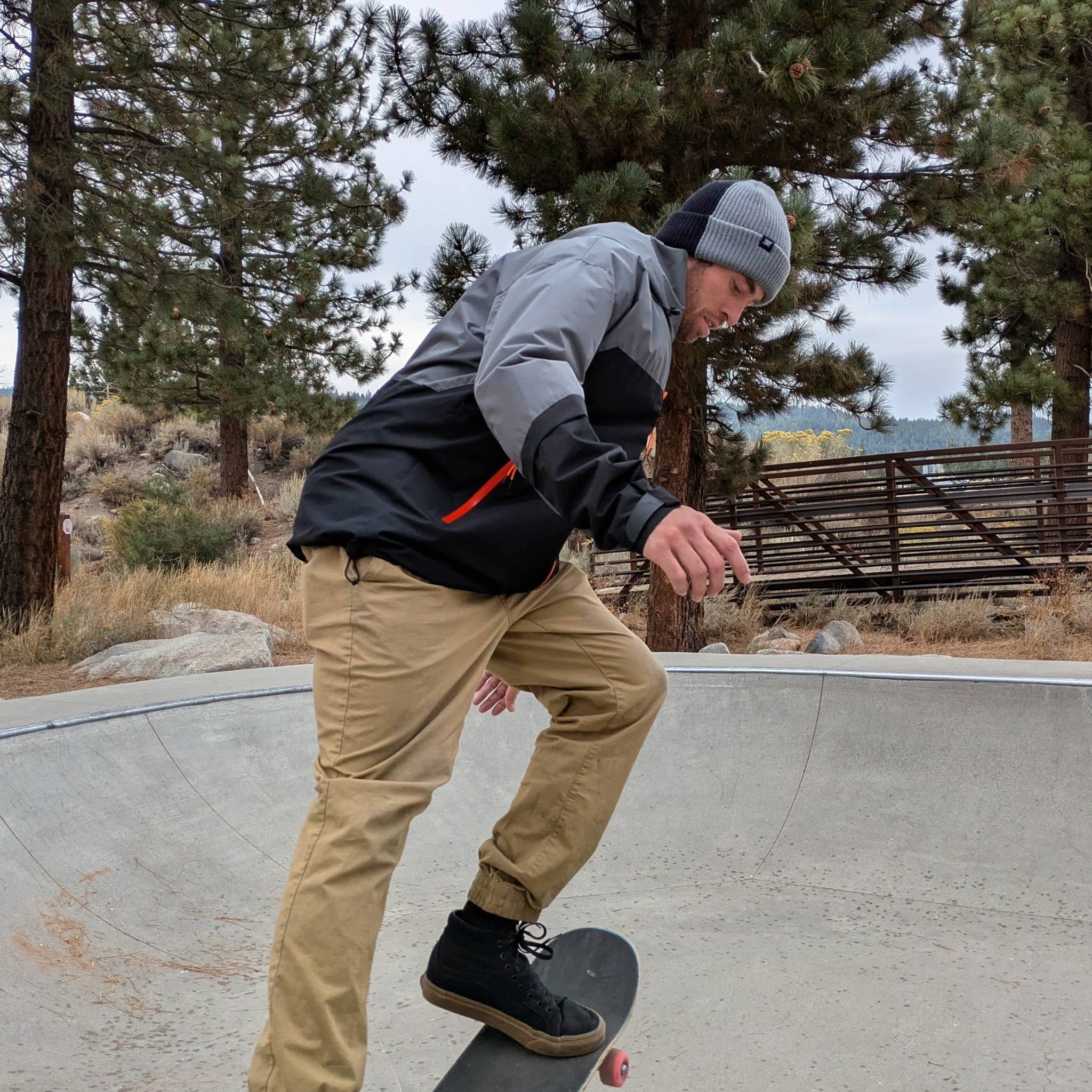 Skater wearing the versatile black and grey beanie as streetwear